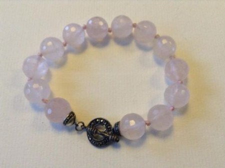 Gefacceteerde rozekwarts armband met Markasiet sluiting 20cm € 25,00